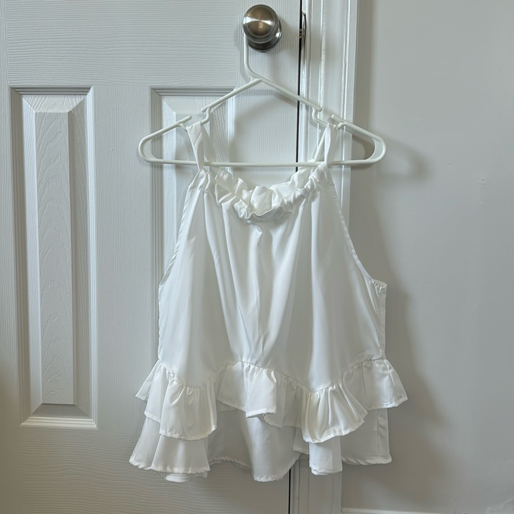 Size large white women’s top.